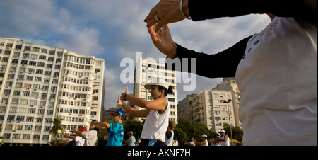 Tai chi chuan class at Copacabana beach in the morning Rio de Janeiro Brazil Stock Photo