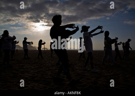 Tai chi chuan class at Copacabana beach in the morning Rio de Janeiro Brazil Stock Photo