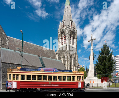 Traditional tram in front of Christchurch Cathedral, Christchurch, South Island, New Zealand. Image taken before the 2011 earthquake. Stock Photo