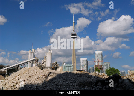 Pile of rubble at cement factory for construction in downtown Toronto with CN Tower Stock Photo