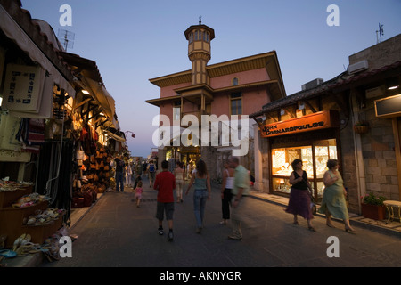 People strolling over shopping street Odos Sokratous in the evening Rhodes Town Rhodes Greece Stock Photo