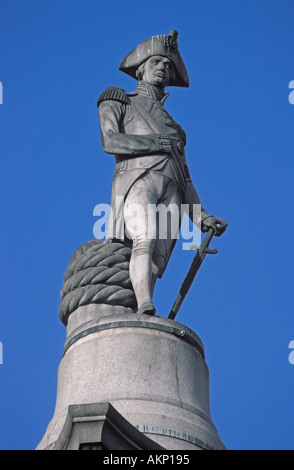Close up of Lord Admiral  Horatio Nelson sandstone statue mounted on stone plinth at pinnacle of Nelson's Column located in Trafalgar Square, London Stock Photo