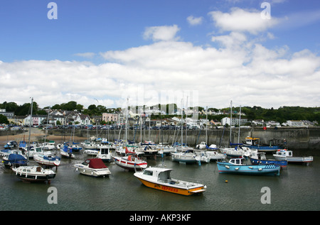 View of popular seaside town Saundersfoot harbour with moored boats Pembrokeshire West Wales UK Stock Photo