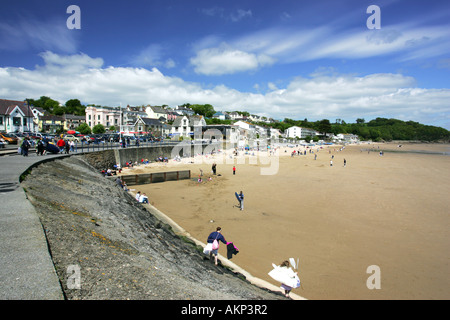 View of popular seaside town Saundersfoot beach with tourists on sand Pembrokeshire West Wales UK Stock Photo