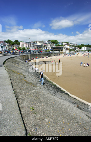 View of popular seaside town Saundersfoot beach with tourists on sand Pembrokeshire West Wales UK Stock Photo