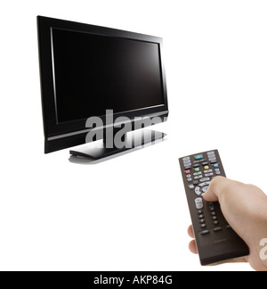 TV set and a person with a remote Stock Photo