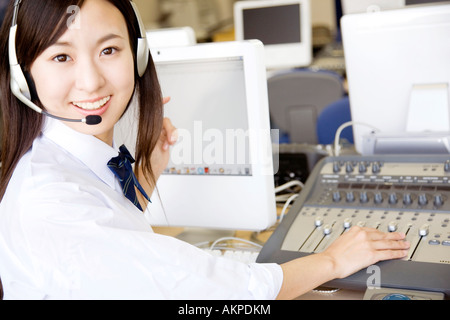 High school girl using a headset Stock Photo