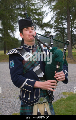 Peter Grant a Scottish Solo Piper, Playing the Bagpipes at Braemar Castle, Scotland, UK Stock Photo