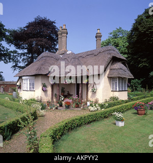 Somerleyton English village thatched roofed cottage country home and front garden Suffolk East Anglia England UK Stock Photo