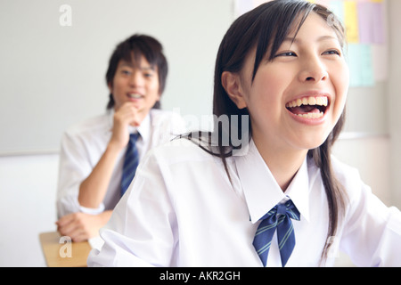 High school girl taking school lessons Stock Photo