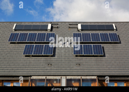 Solar panels on a house roof at Cambourne Village Cambridgeshire Stock Photo