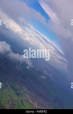 Aerial of earth view with dramatic clouds and blue sky Stock Photo