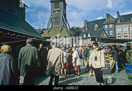 HONFLEUR NORMANDY FRANCE April Shoppers at the busy weekly Saturday market at the Place St Catherine Stock Photo