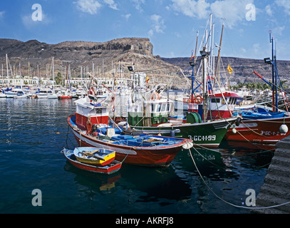 PUERTO DE MOGAN GRAN CANARIA February Colourful fishing boats in the harbour of this old fishing village Stock Photo