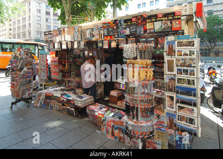 Barcelona pavement kiosk selling newspapers magazines cards guides in square adjacent to the old cathedral Stock Photo