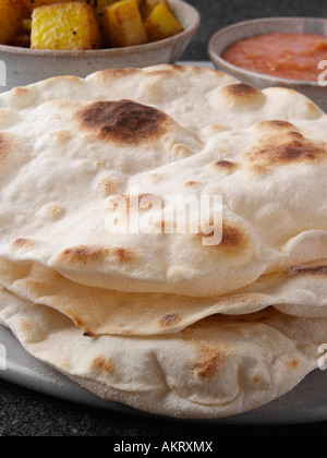 Chapattis with potato curry and tomato chutney editorial food Stock Photo