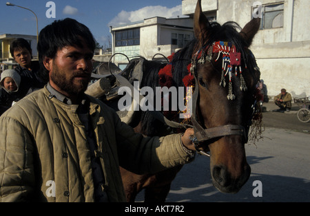 man & decorated horse Kabul Afghanistan Stock Photo