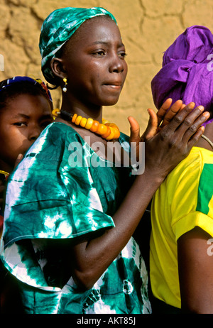 Dogon women dance in procession during a village celebration, Mali Stock Photo