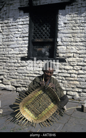 basket weaver Annapurna trail Nepal Stock Photo