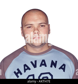 young man with shaved head Stock Photo