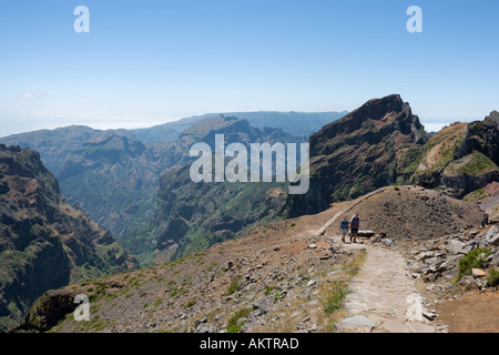 Hikers on the path from Pico de Arieiro, Madeira, Portugal Stock Photo