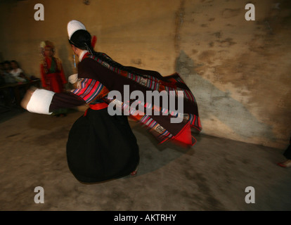 Traditional tibetan dances Their folklore and traditional dresses are wide practised among tibetan refugees in Nepal Stock Photo