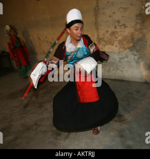 Traditional tibetan dances Their folklore and traditional dresses are wide practised among tibetan refugees in Nepal Stock Photo