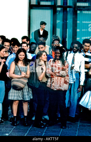 Paris France, Street Scene, Mixed Races, Large Crowd People, Watching Teen Performance Group, Standing outside, multicultural, diverse people global Stock Photo