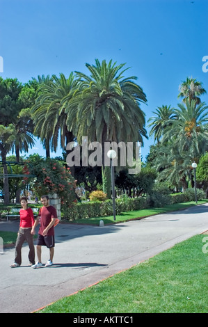 Nice France, Young Couple Walking in Park "Square General Leclerc" in "Center of City" French  Romantic south france couple street Stock Photo