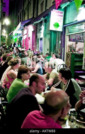 Perpignan France, Crowded Terrace, People Eating on Sidewalk , Spanish Restaurant , City Center at Night, Outside Lights Stock Photo