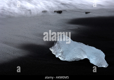 Icy lying on black volcanic beach. Iceland Stock Photo