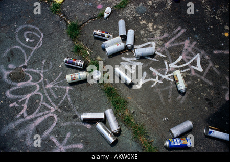 Manhattan New York USA Discarded aerosol cans on the ground Stock Photo