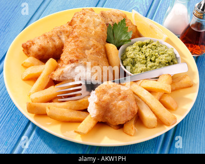 FISH AND CHIPS WITH MUSHY PEAS Stock Photo