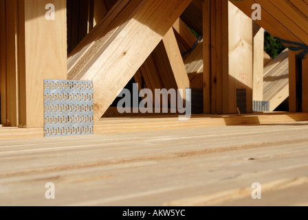 Roofing joists ready for use on construction site in the UK Stock Photo