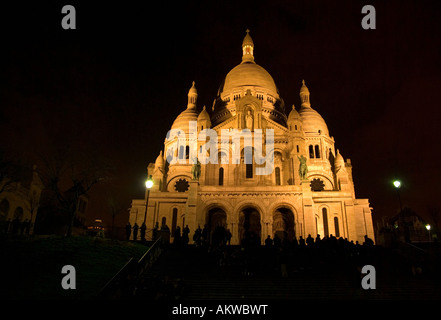 Sacre Coeur church in Montmartre a favourite gathering place for the young Stock Photo