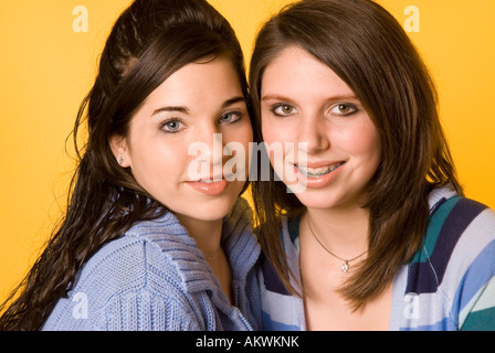 Closeup of Two Caucasian Teen Girlfriends (15-17) Hanging Out, Making Eye Contact USA Stock Photo