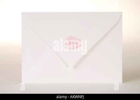 Envelope with lipstick kiss, close-up Stock Photo