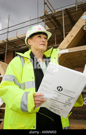 Woman surveyor inspecting a new development Stock Photo