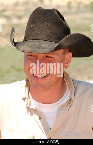 Cowboy smiling Stock Photo