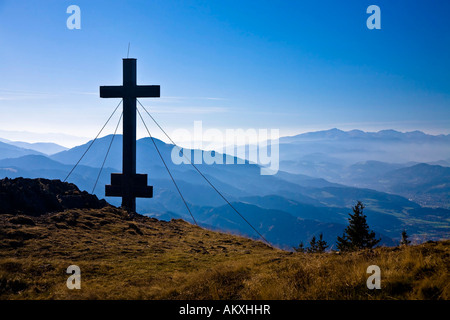 Summit cross (1629m) Rennfeld with look at the Mugelkuppe and Hochalpe Styria Austria Stock Photo
