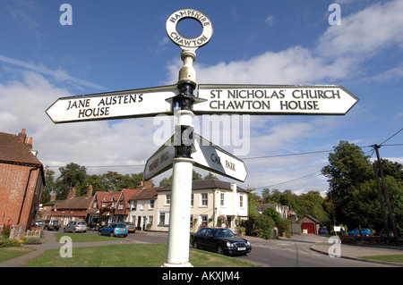 The road sign pointing  to author Jane Austens house in the village of Chawton Hampshire Stock Photo