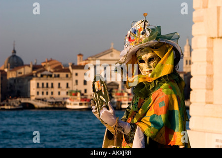Mask in evening light at the carnival, Venice, Italy Stock Photo