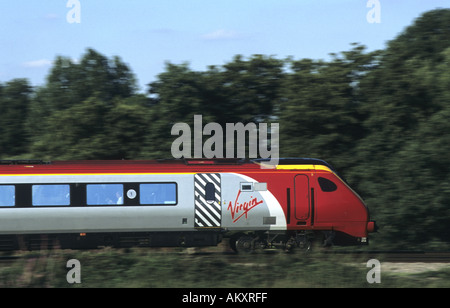 Virgin Trains Voyager diesel train at speed, Warwickshire, England, UK Stock Photo