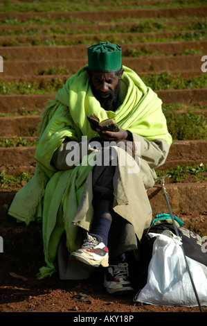 Ethiopian Orthodox man reading an old book Addis Abeba Ethiopia Stock Photo