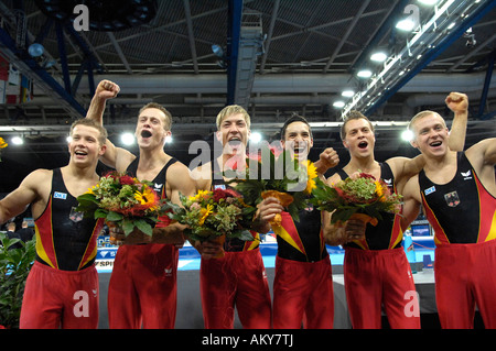 German Gymnast Team Men celebrating bronze medal in team finals Artistic Gymnastics World Championships Stuttgart 2007 Germany Stock Photo