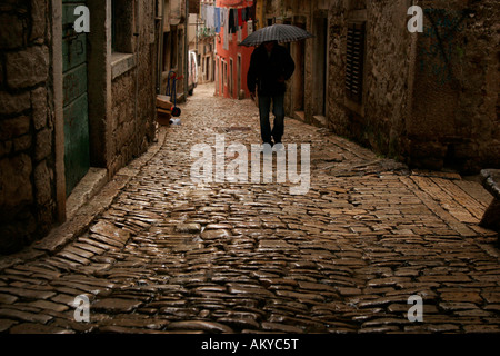 Cobble stone pavement in the old part of town, Rovinj, Croatia Stock Photo