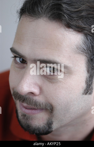 A portrait of a friendly bearded man. Stock Photo