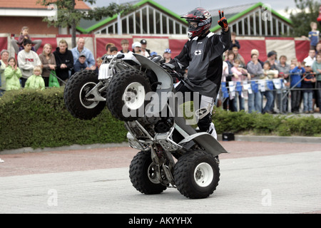 Monstertruck and Stuntshow, a Quad driving only on two wheels, Radeberg, Saxony, Germany Stock Photo