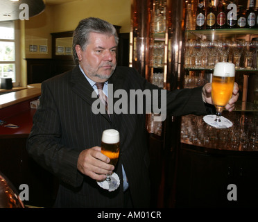 Prime minister of Rhineland-Palatinate Kurt Beck with glasses of beer Stock Photo