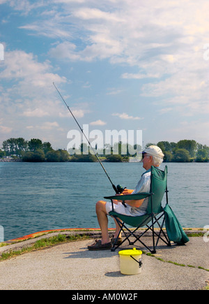 Man Uniform Fishing Rod Sits Felt Boots Chair Ice River Stock